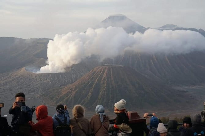 1 Day Mount Bromo Sharing Tour Package from Malang - Finding green grass at Teletubbies Hill