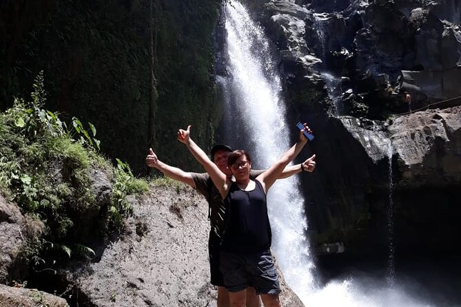 Adventures Tour : Bali Hidden Canyon Trekking - Beji Guwang - Gunung Kawi: cliffs, river, and carved stone