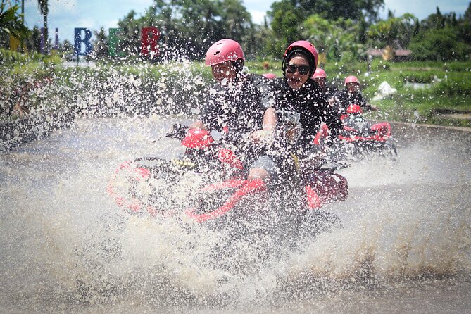 ATV Quad Bike Kuber Through Waterfall, Tunnel And Rice Field - Waterfalls give the ride its wet-weather character