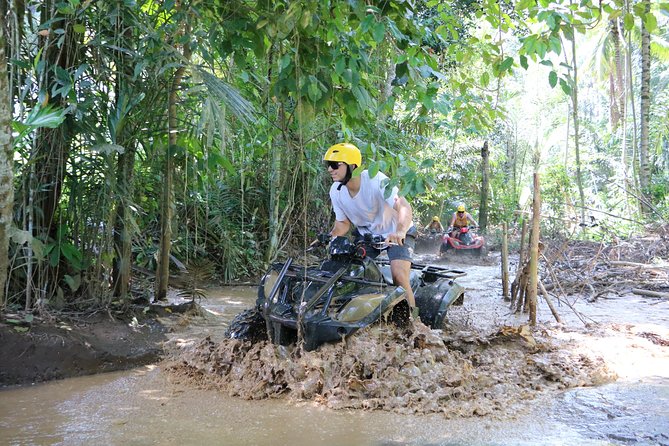 Bali ATV Ride Combo Bali Rafting best fullday tour Package - Taking the ATV through Bongkasa village