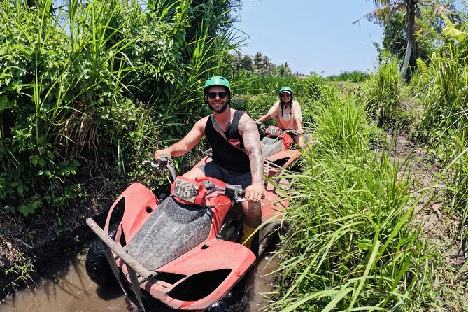 Bali ATV Ride Ubud Waterfall, Ricefield,River,Barong Cave, Lunch - Getting ready for a muddy 1.5-hour ride