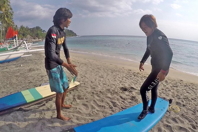 Beginner surf lesson private class - Adult - From beach briefing to first paddles