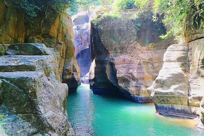 Cunca Wulang Waterfall & Rangko Cave – Full Day Nature Escape - A Forest Canyon Before the Coast