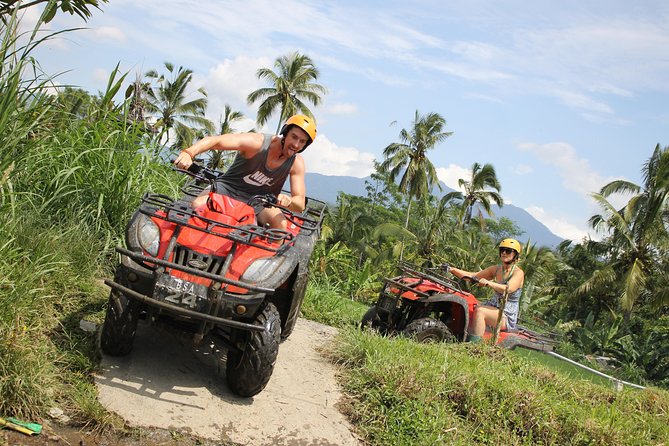 Full-Day Bali Adventure Tour with Quad Bikes and Rafting - Mud, showers, and an Indonesian buffet lunch