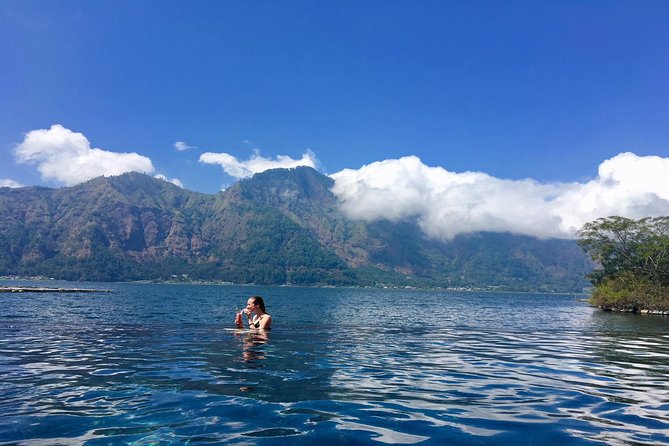 Mount Batur Sunrise Trekking & Hot Spring Tour - Sunrise above the volcano