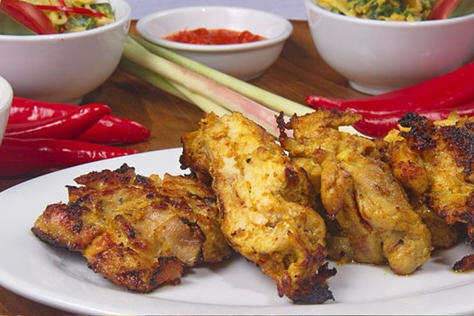Nia Bali Seminyak Cooking Class - The main dishes: betutu, sweet pork, and satay