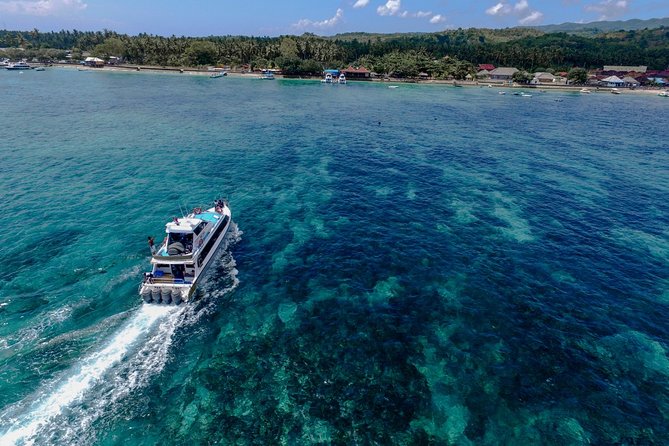 Nusa Lembongan Island: Snorkeling & Mangrove Forest Day Tour - Yellow Bridge and the split-second photo stop