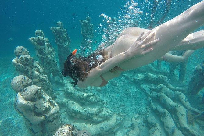 Private Snorkeling Gili Island (Coral, Statue and Turtle) - The advertised sunken scooters add a quirky stop