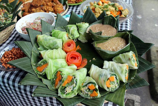 PRIVATE Ubud Market Tour & Balinese Cooking Class with Putu - Cooking with Putu in a two-burner kitchen