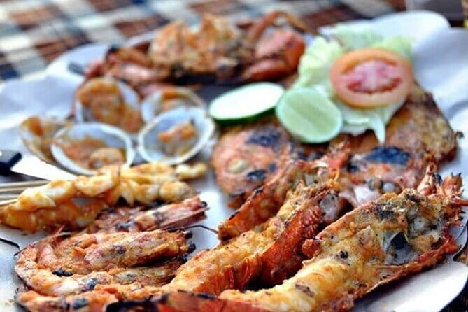 Romantic Seafood Dinner at Jimbaran Beach Bali include Sunset - Package B: more seafood, more value for big appetites