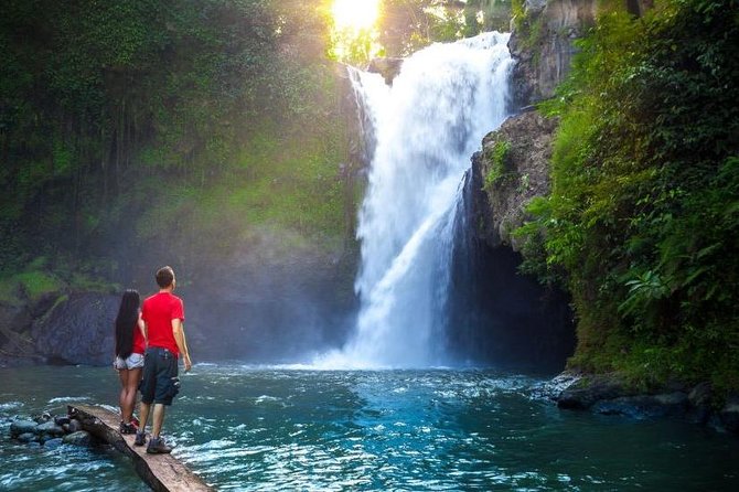 Tanah Lot Tour with Ubud Monkey Forest, Rice Terraces, and Waterfalls - Tanah Lot and the temple by the sea