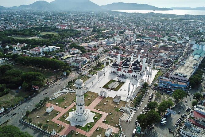 Tsunami Museum and Affected Areas Tour of Banda Aceh - Paying respects at the mass graveyard