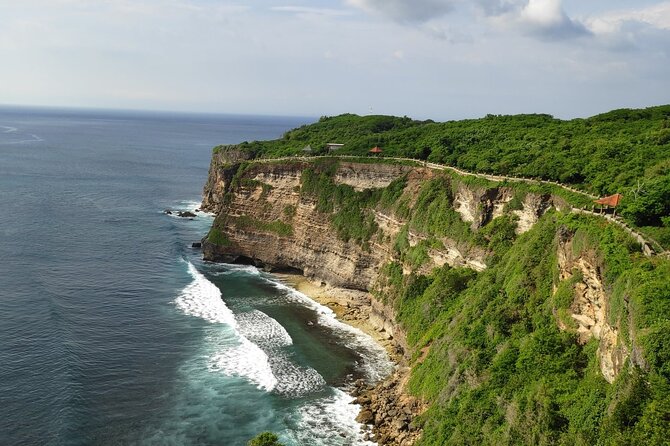 Uluwatu Cliff Temple sunset Tour with Kecak Show and Sea Food Dinner at Jimbaran Beach - The temple visit, monkeys, and open sea